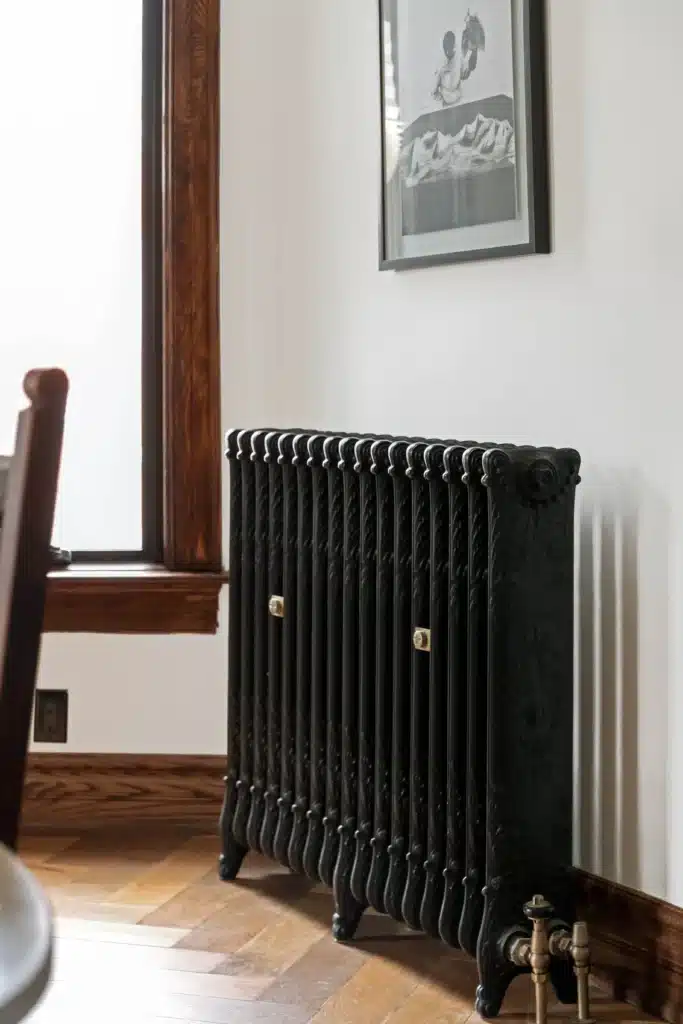 Victorian dining room renovation in Toronto with restored radiator (close up shot)